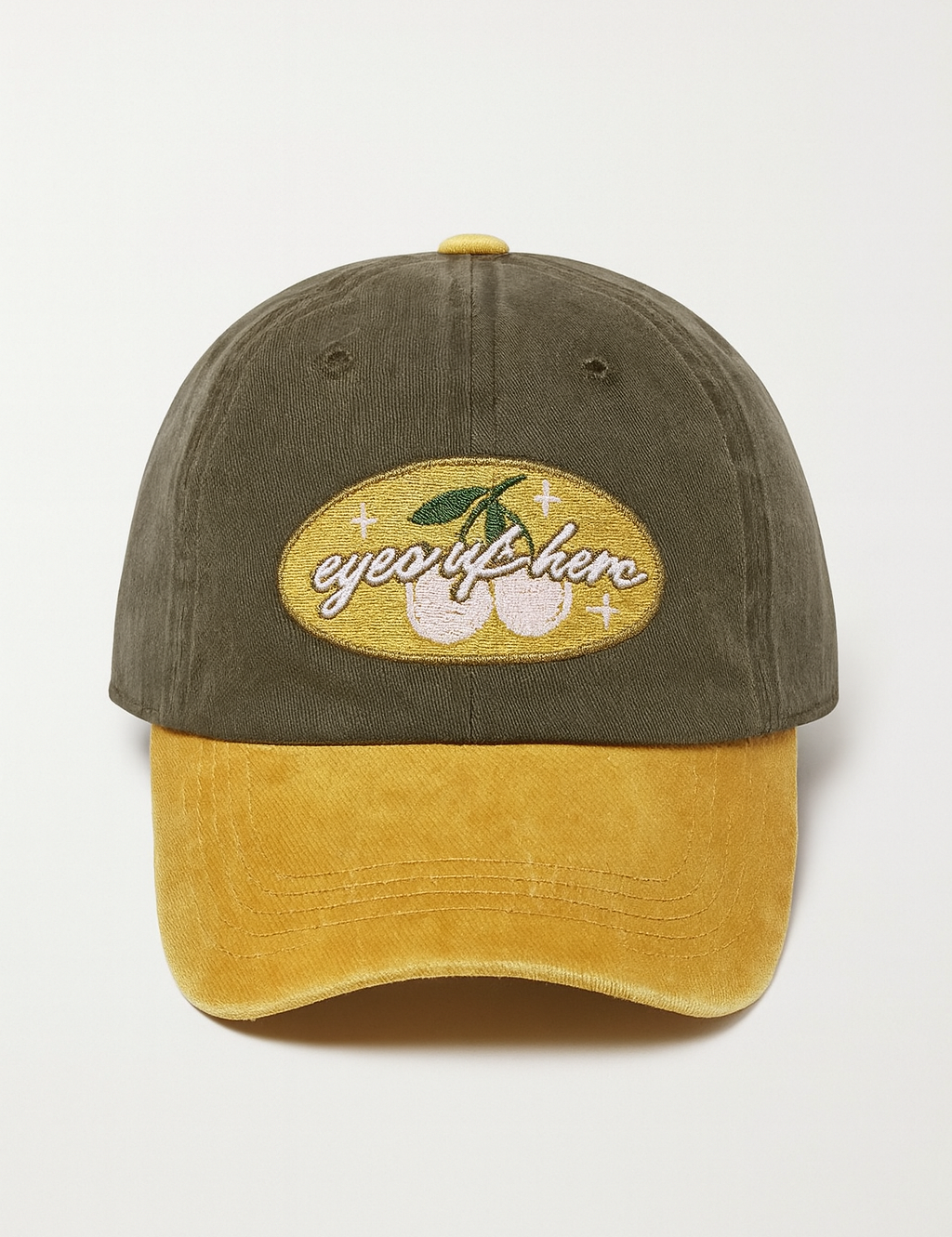 Eyes_Up_Here_Cap_Yellow_Gray_Flatlay.png